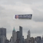 Banner hoisted in New York against attacks on Bangladeshi Hindus: circled the Statue of Liberty; appealed to Americans to boycott Bangladeshi clothes